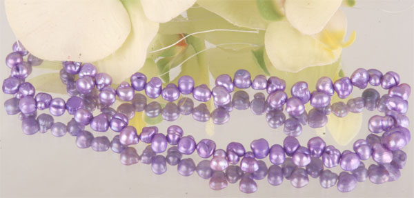 Perlenstrang irregular 5-6mm violett S101