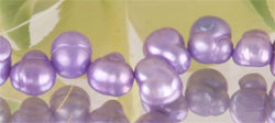 Perlenstrang aus Echten Zuchtperlen 5-6mm irregular violett ca. 38cm lang